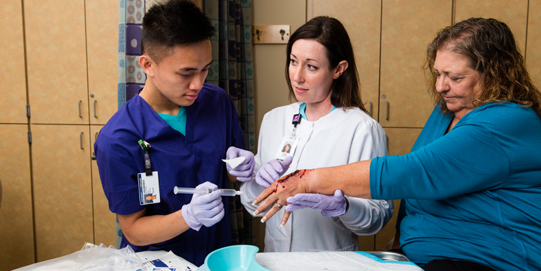 1 Student, faculty, patient with hand wound