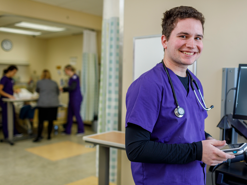 nursing male student in simulation room