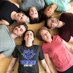 People Sitting in a Circle Smiling 
