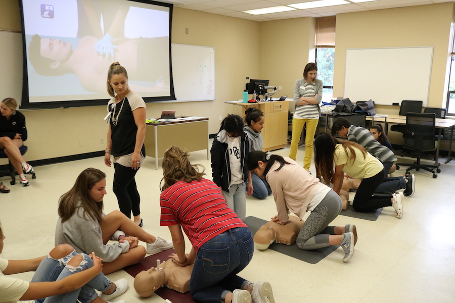 Students receiving CPR training